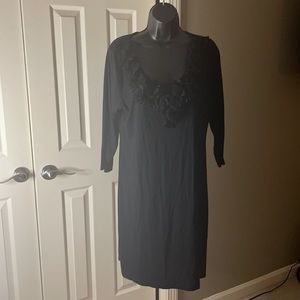 Black dress with floral ruffle collar